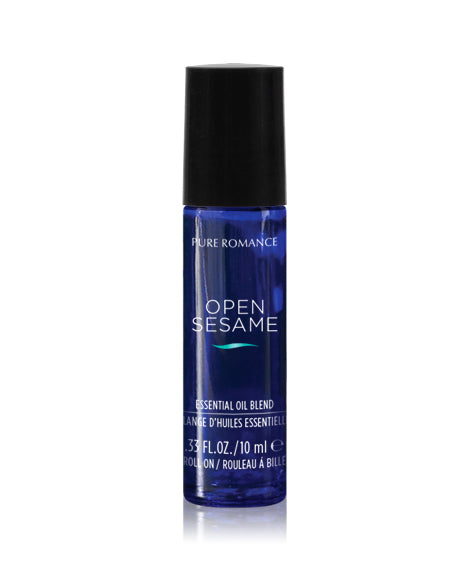 Open Sesame perfume oil bottle with black cap, dark blue label