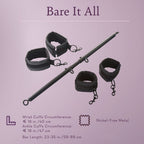 Black cuff restraints and metal bar with chain links, four-piece kit