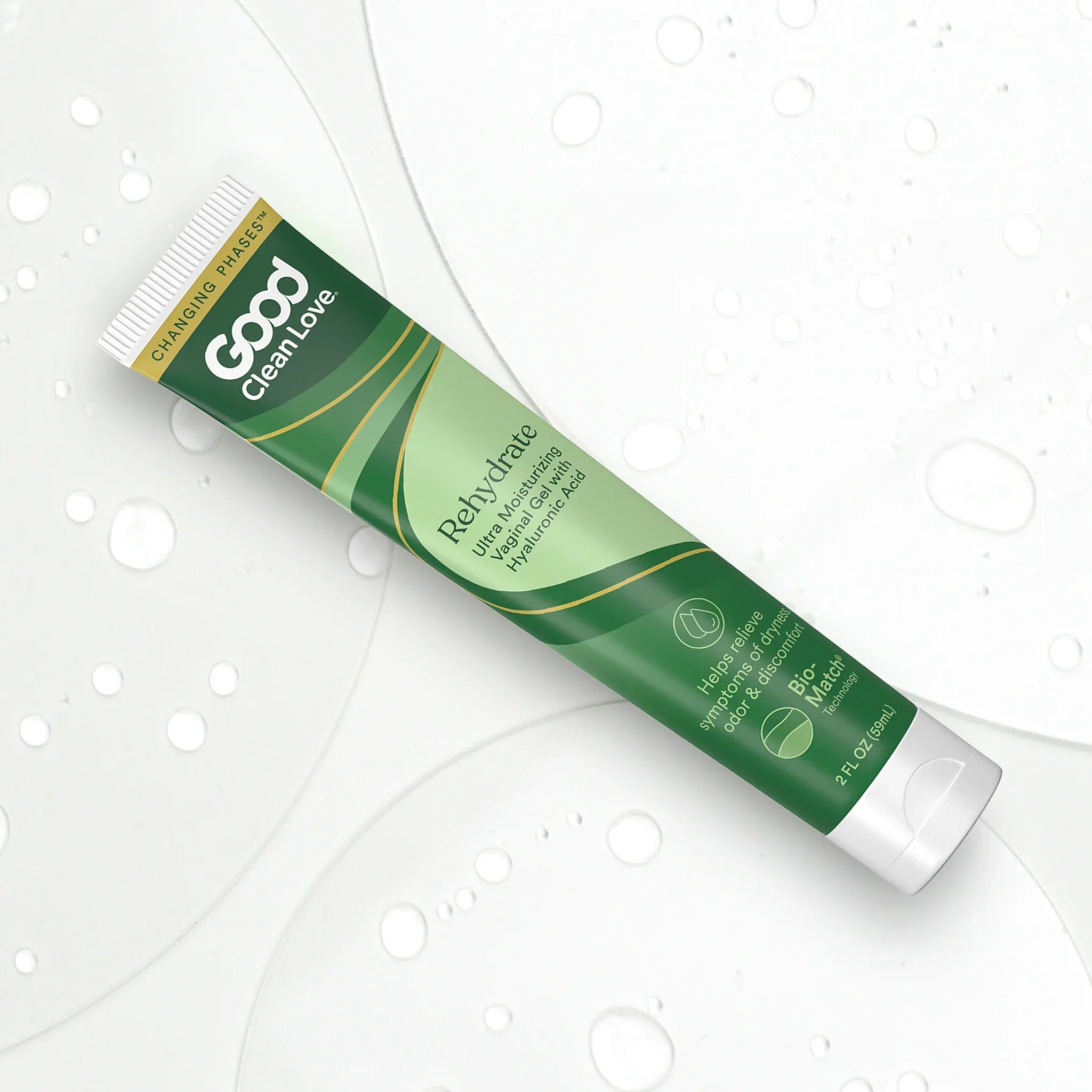 Vaginal gel tube, green stripe packaging with white cap.