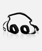Black spreader cuffs with padded straps and headband-style band
