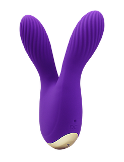 Purple rabbit-shaped silicone toy with two upright ears and curved base