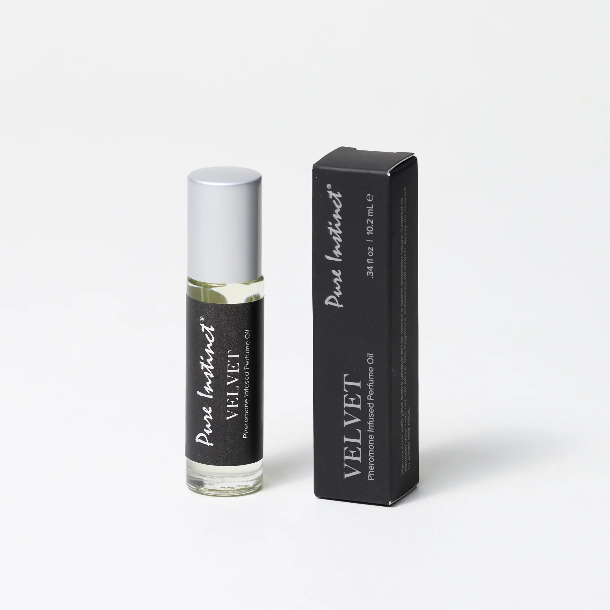 Velvet pheromone roll-on bottle with silver cap and matching black box