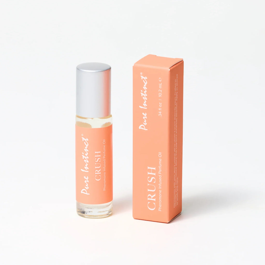 Pheromone roll-on perfume bottle with silver cap and orange product box