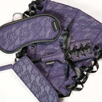 Purple patterned blindfold and lace-up restraint cuffs with connecting straps