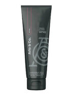 Shampoo and body wash tube, dark gray, vertical label and branding