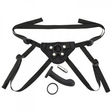 Black strap-on harness kit with front panel, multiple adjustable straps, metal rings and ring