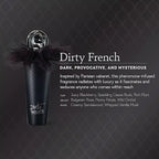 Perfume bottle with dark label, clear cap, and black tulle ruffle bow