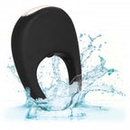 Black silicone pleasure ring with open finger hole, water splash shown behind product