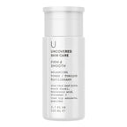 Balancing toner bottle, white cap; firm & smooth, balancing formula text on label.