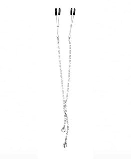 Nipple clamps with long chain ties and small dark clamp tips