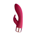 Pink silicone personal massager with curved head and gold-tone battery end
