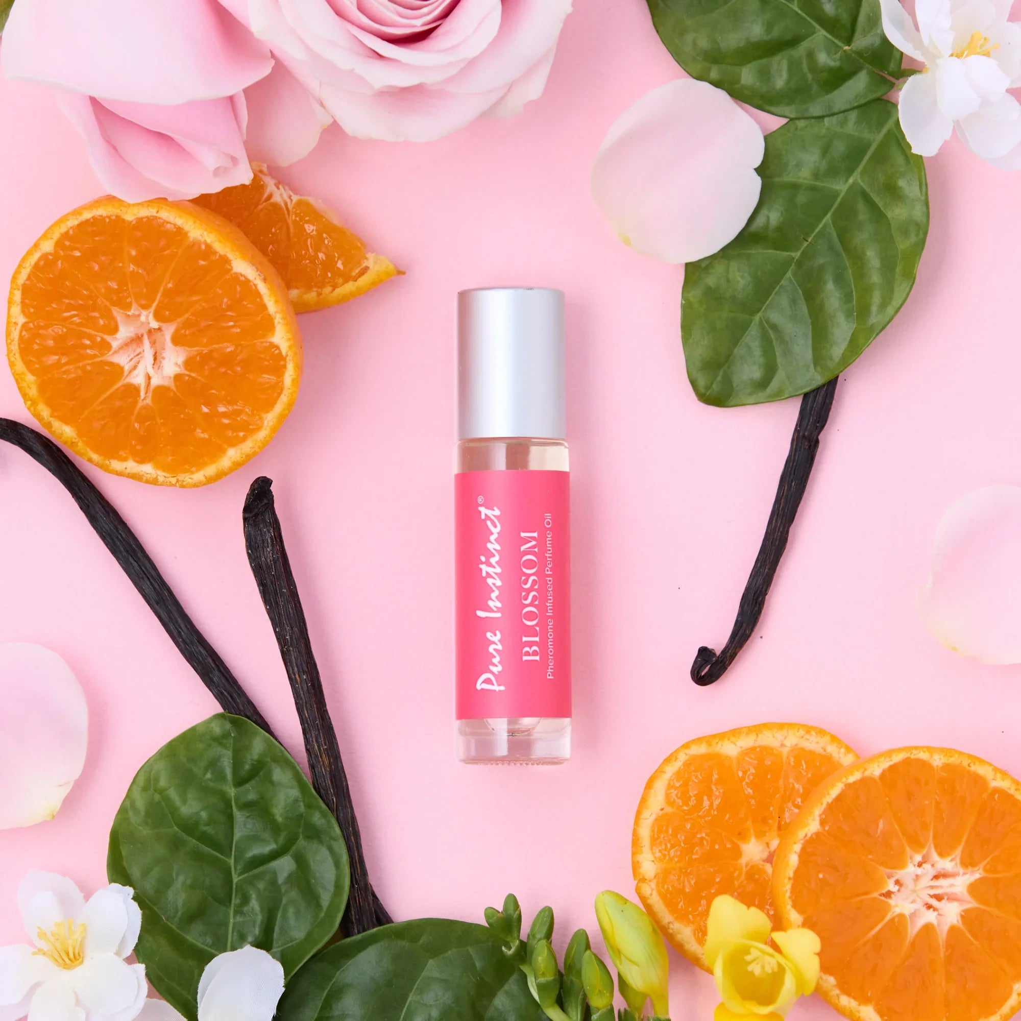 Pink Blossom pheromone roll-on bottle with silver cap and red label