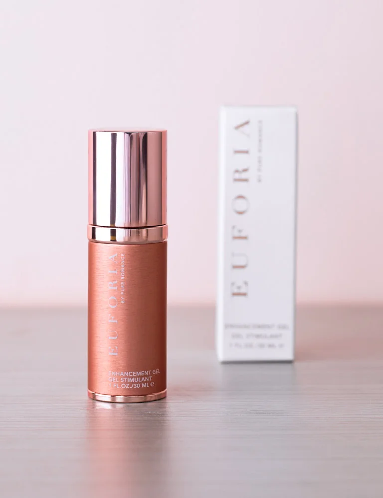 Enhancement gel bottle with rose-gold finish and chrome cap, with white box