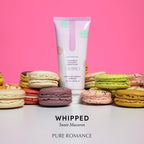 Squeezable lubricant tube in pale pink with macaron illustrations and bright cap base