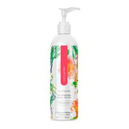 Body lotion bottle with white pump and colorful tropical label
