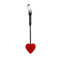 Mini spade paddle, red heart-shaped head, black braided handle with loop strap