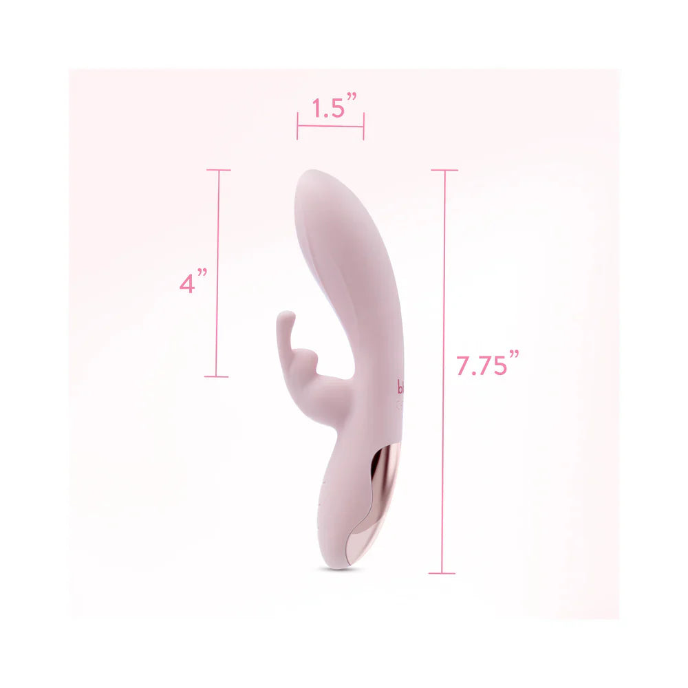 Pink rabbit-style vibrator with size diagram showing compact dimensions