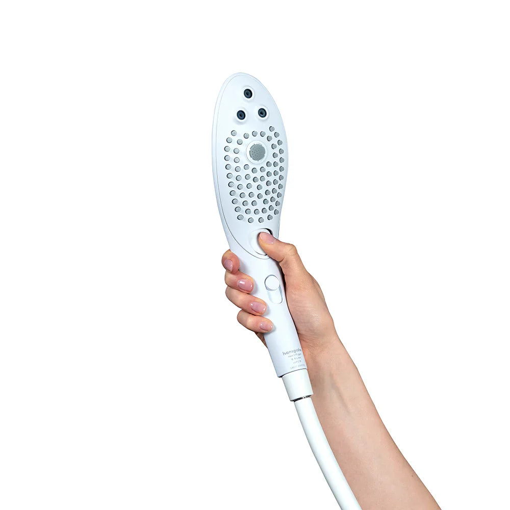 Hand holding power shower head, front sprayer head and side buttons visible