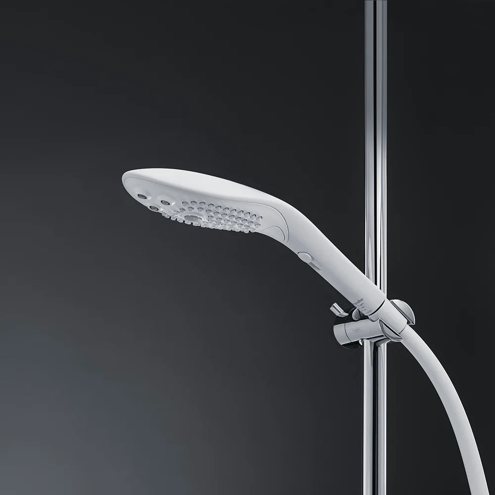 Power shower head releasing a steady water spray from the nozzle plate