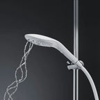 White handheld shower head with spray nozzles and hose connection