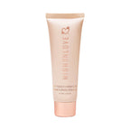 Light pink hand cream tube with ribbed cap and vertical brand logo