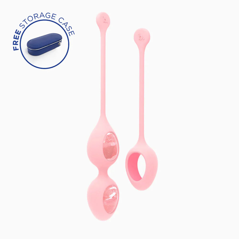 Pair of pink rose quartz-style eggs with handles, oval shapes