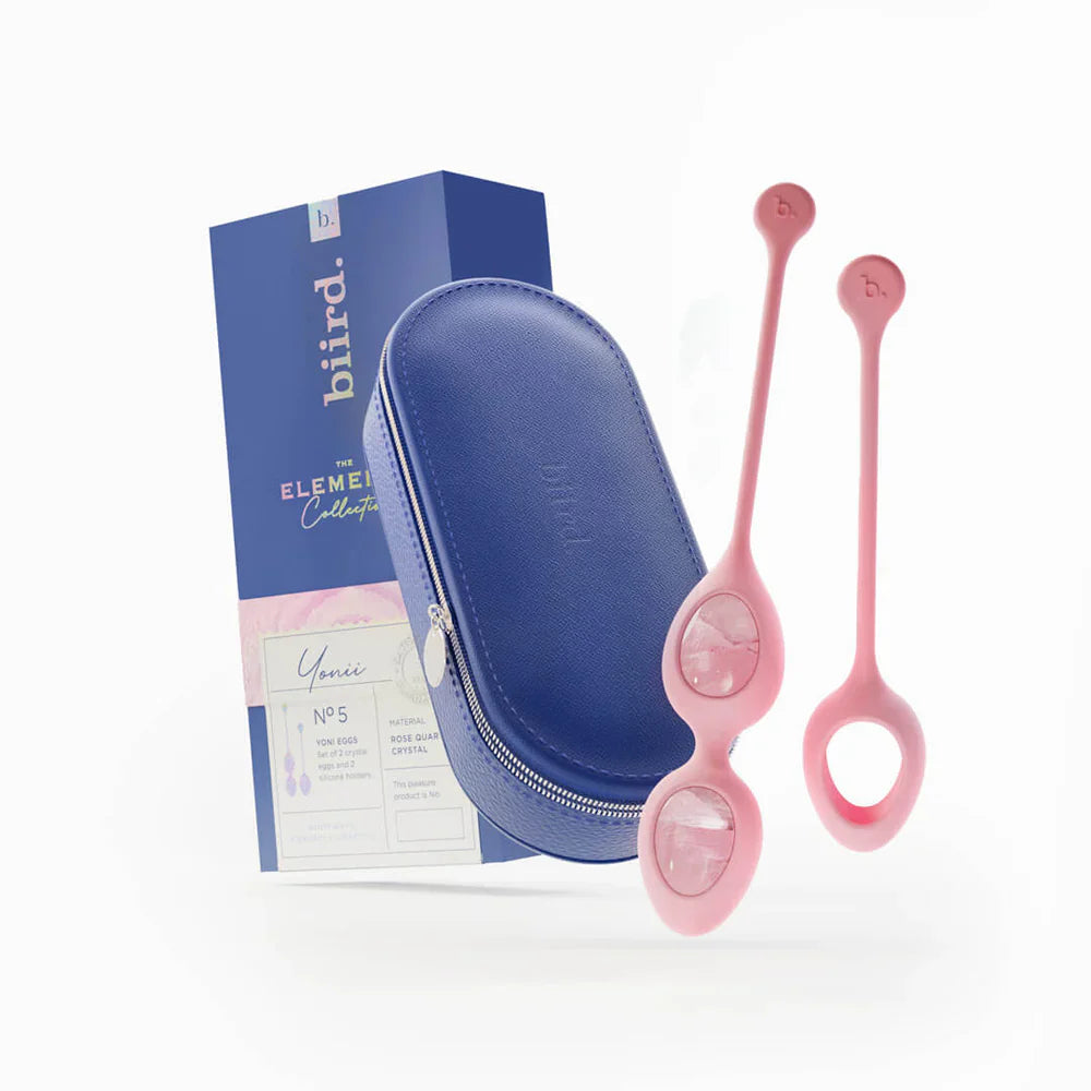 Pink rose quartz-style egg set with blue storage case and two oval egg pieces