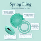 Teal silicone bath toy with flower-textured pad, two rings, and oval remote