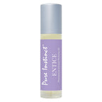Pheromone roll-on bottle with silver cap and purple label