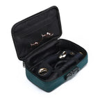 Teal locking storage box with open lid, black interior and compartment straps