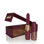 Maroon lipstick with gold cap in open box, plus matching leopard-print tube