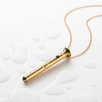 Gold cylindrical bar pendant necklace with chain