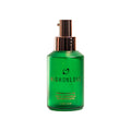 Luxury firming body oil bottle, green glass with rose-gold pump, HIGHONLOVE label.
