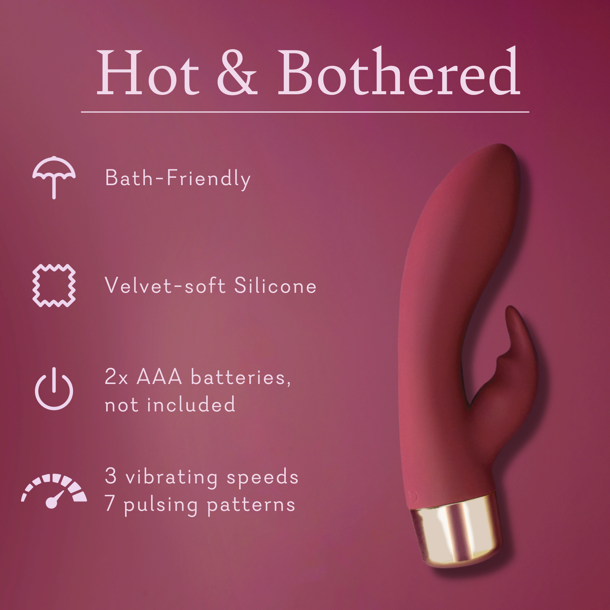 Pink silicone personal massager with curved dual tips and gold-tone base