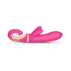 Pink personal massager lying flat with gold-tone accent ring and small tip