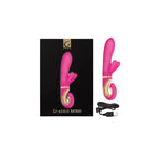 Pink mini personal massager with gold-tone ring and included black cable
