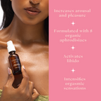 Amber intimate oil bottle held near skin with white pump top