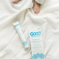 BioGenesis fertility lubricant tube with blue label, held on white packaging surface