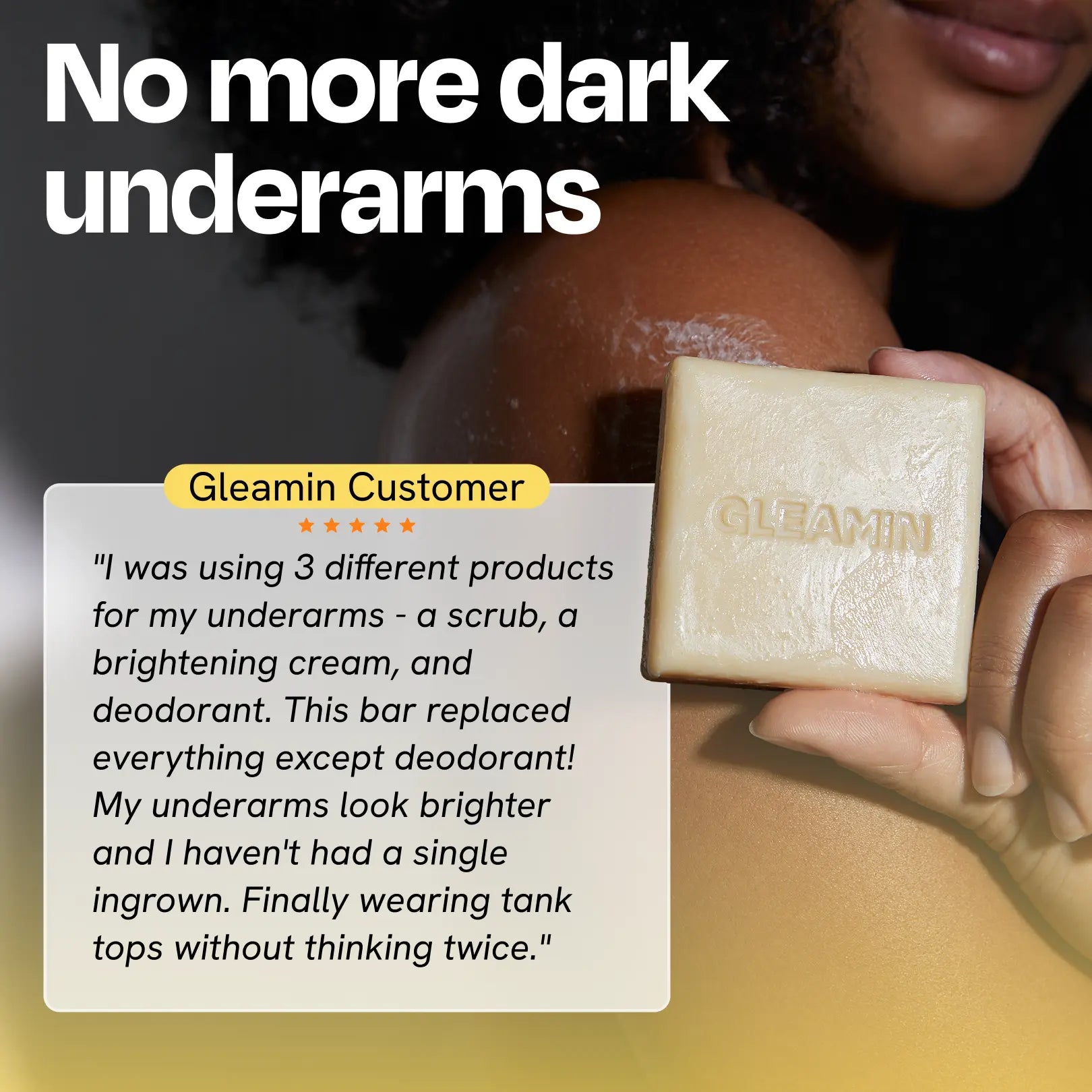 Cream square body bar soap held in hand with visible logo