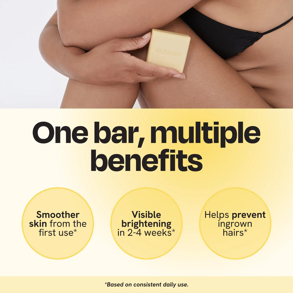 Small cream square body bar soap held on bikini area skin