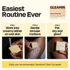 Cream square body bar soap in hands with lather on skin