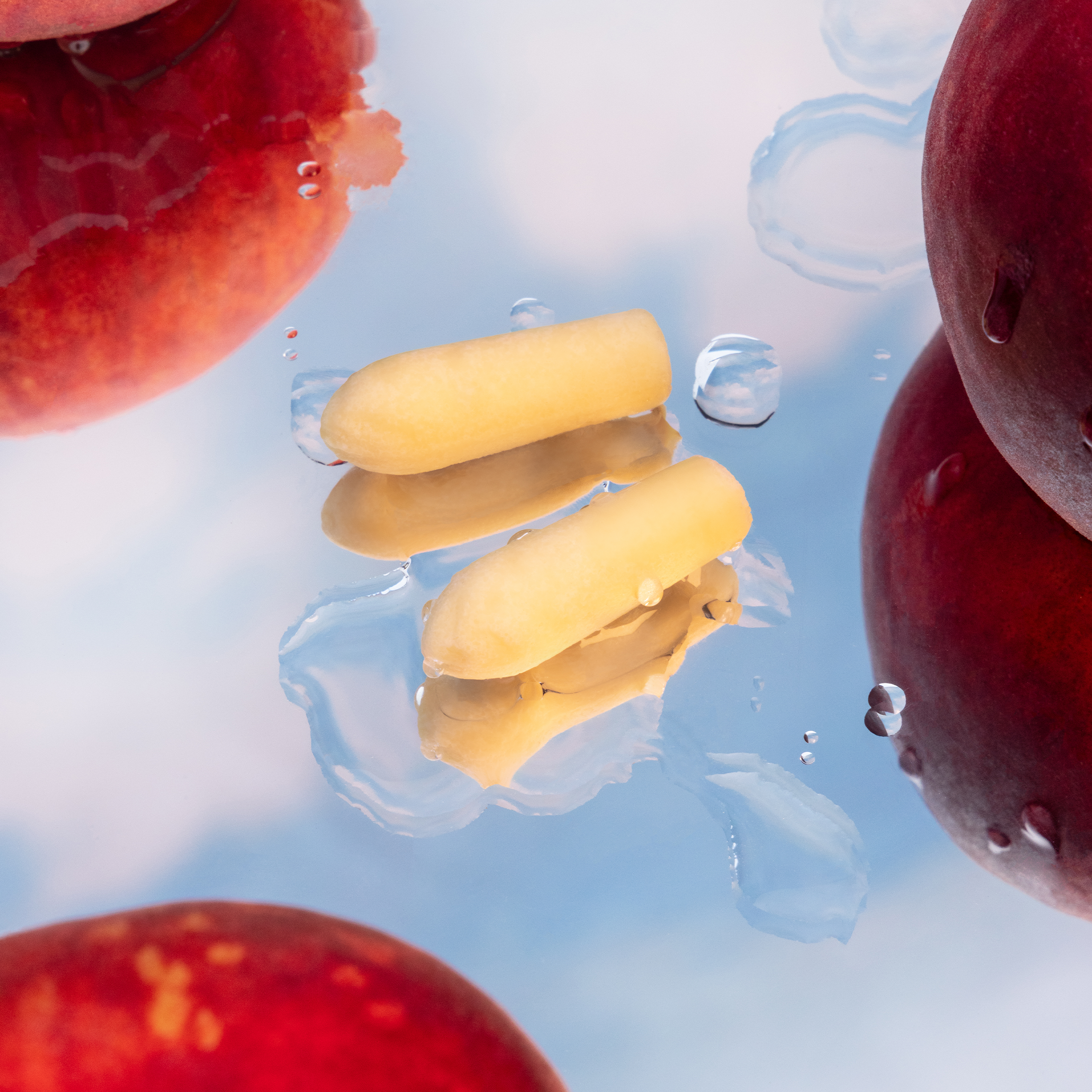Yellow suppository pieces with clear gel swirls