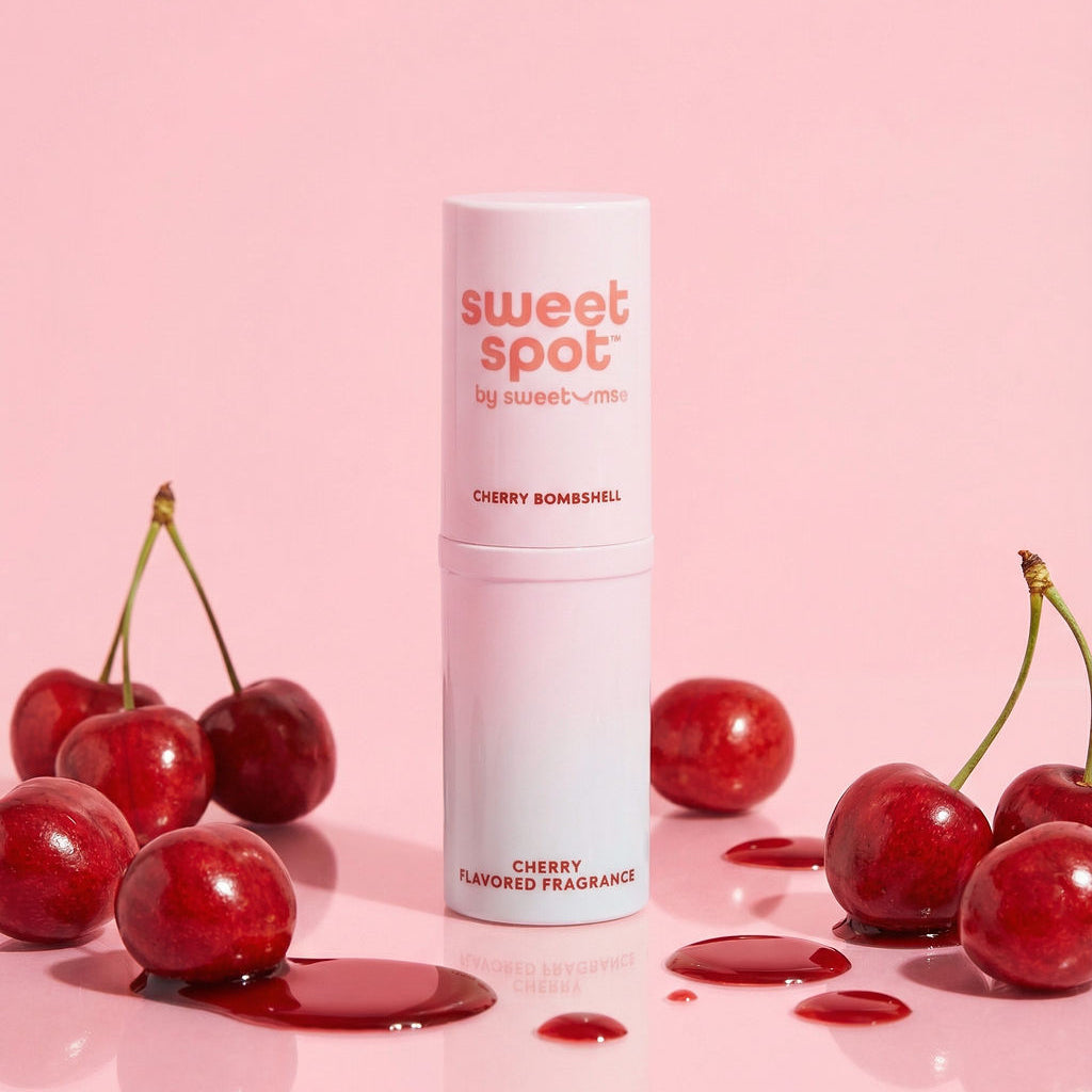 Pink Sweet Spot solid fragrance stick tube with rounded top and Cherry Bombshell label
