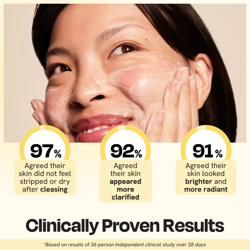 Cleansing gel on face with yellow cleanser tube held near cheek