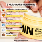 Yellow moisturizer jar close-up with silver lid and bold black label.