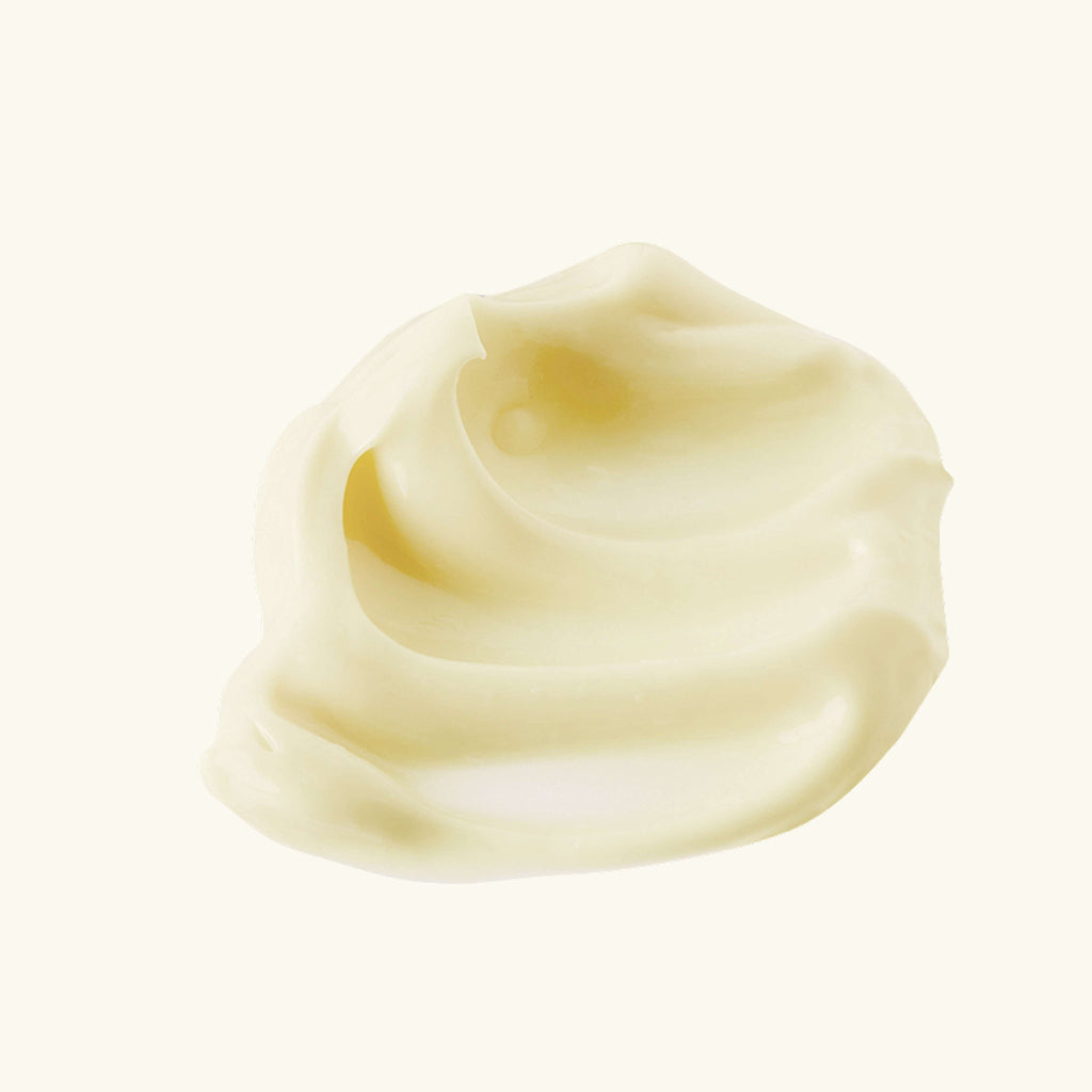 Thick pale-yellow moisturizer cream dollop.