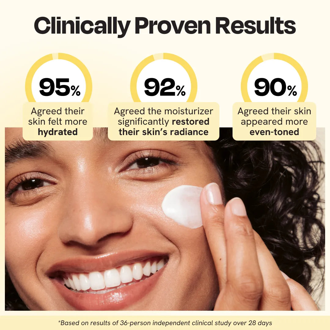 White moisturizer applied to a smiling cheek.