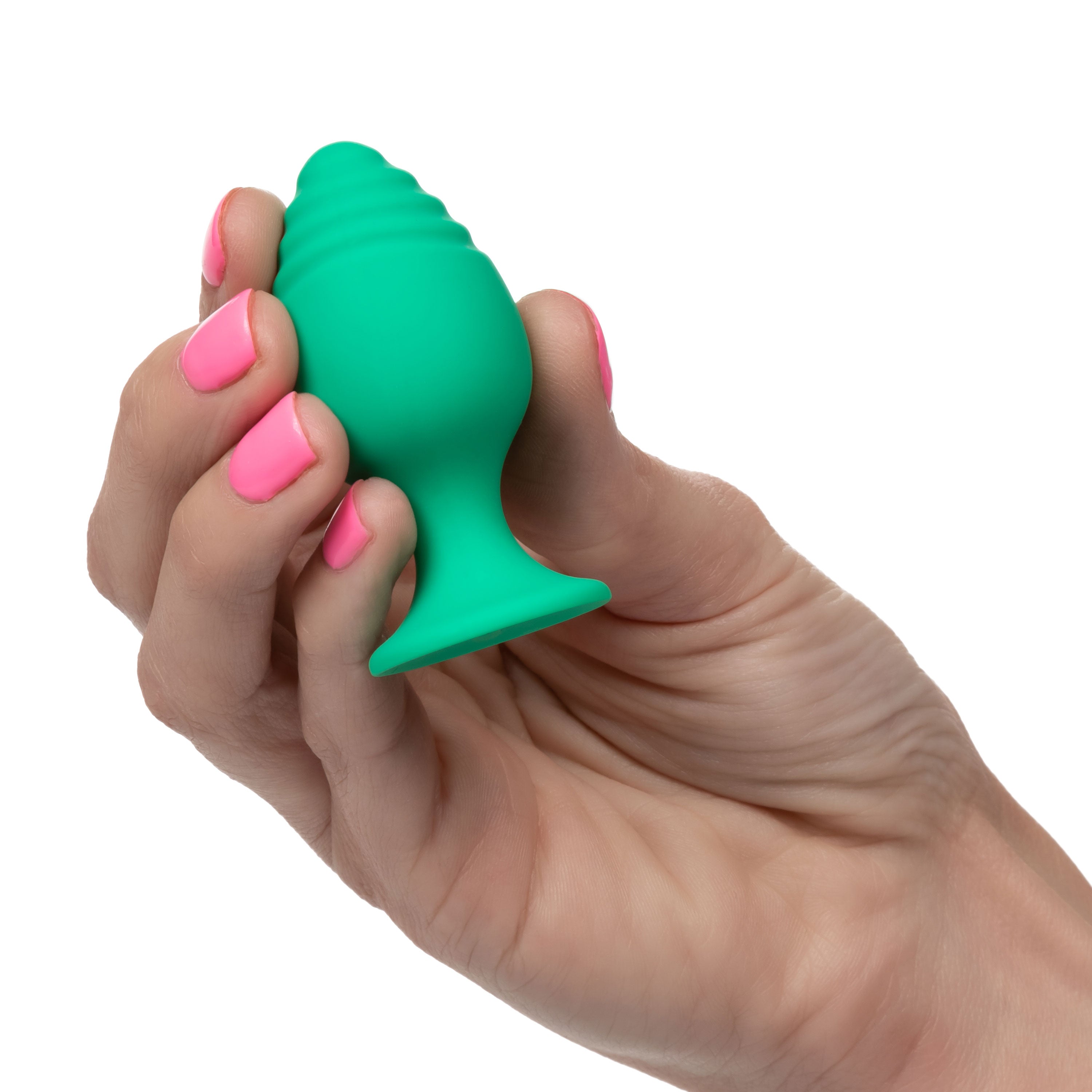 Green silicone anal plug in hand, bulbous top and tapered tip
