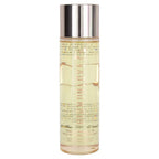 High Love massage oil bottle with gold spray-style cap, clear amber liquid