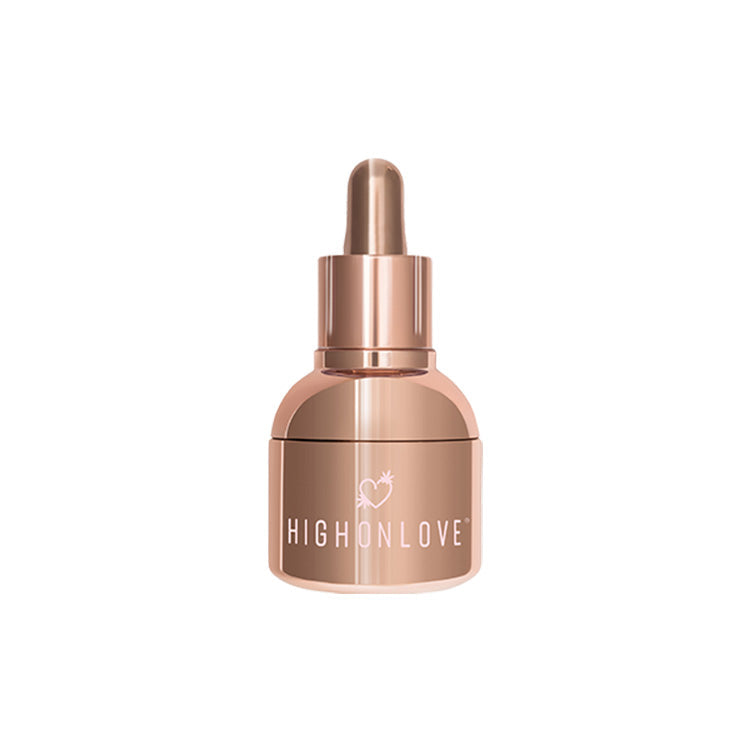 Rose gold oil bottle with pipette-style dropper cap